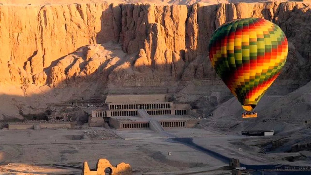 Hot air balloons over the West Bank on a Valley of the Kings tour from Luxor, Egypt