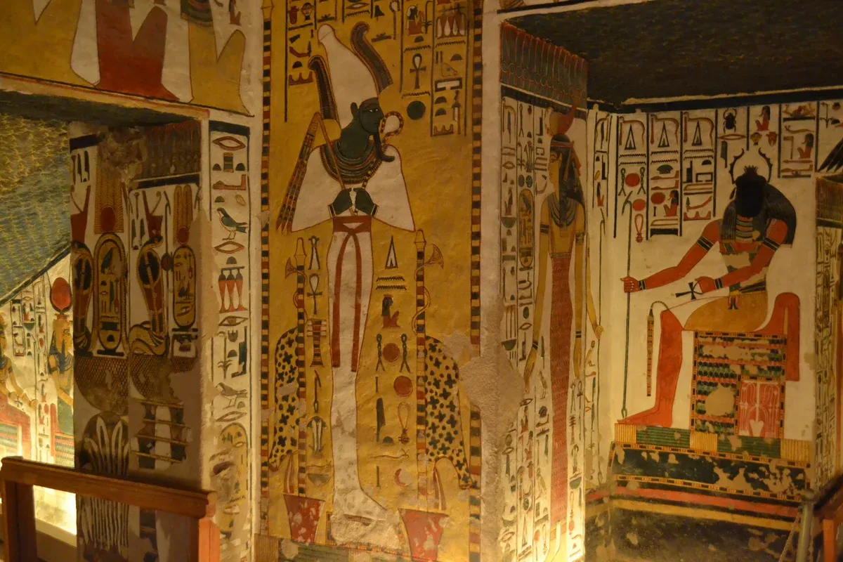 Osiris, Khepri and Nefertari painted on the wall of Nefertari's tomb in the Valley of the Queens, seen on a Valley of the Kings tour